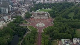 5.5K aerial stock footage orbiting the Victoria Memorial monument and Buckingham Palace, London, England Aerial Stock Footage | AX114_208E