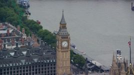 5.5K aerial stock footage of Big Ben, reveal British flag, London, England Aerial Stock Footage | AX114_224