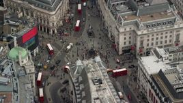 5.5K aerial stock footage of an orbit of Piccadilly Circus and double decker buses, London, England Aerial Stock Footage | AX114_237