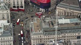 5.5K aerial stock footage orbiting traffic at Piccadilly Circus in London, England Aerial Stock Footage | AX114_240