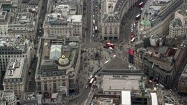 5.5K aerial stock footage of Piccadilly Circus with tourists and buses, London, England Aerial Stock Footage | AX114_243