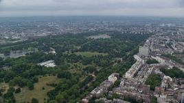 5.5K aerial stock footage of Kensington Gardens and Hyde Park with trees, London, England Aerial Stock Footage | AX114_248