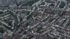 5.5K aerial stock footage of an orbit of residential neighborhoods, London, England Aerial Stock Footage | AX114_269E