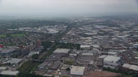 5.5K aerial stock footage fly over warehouses and train tracks near the A40 highway, London, England Aerial Stock Footage | AX114_272E