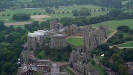 5.5K aerial stock footage of an orbit around iconic Windsor Castle, England Aerial Stock Footage | AX114_315E