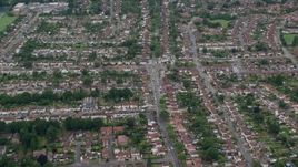 5.5K aerial stock footage of orbiting residential neighborhoods, Addlestone, England Aerial Stock Footage | AX114_357