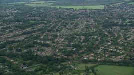 5.5K aerial stock footage fly over residential neighborhoods, Leatherhead, England Aerial Stock Footage | AX114_367E