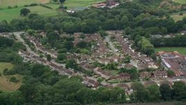 5.5K aerial stock footage of flying over residential community, Redhill, England Aerial Stock Footage | AX114_381