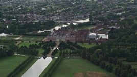 5.5K aerial stock footage of orbiting Hampton Court Palace, Molesey, England Aerial Stock Footage | AX115_020E