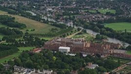 5.5K aerial stock footage of flying around Hampton Court Palace, Molesey, England Aerial Stock Footage | AX115_025