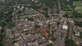 5.5K aerial stock footage tilt while orbiting a residential neighborhood, London, England Aerial Stock Footage | AX115_051E