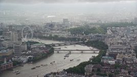 5.5K aerial stock footage video of Waterloo Bridge over the River Thames near London Eye, England Aerial Stock Footage | AX115_095