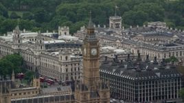 5.5K aerial stock footage of orbiting Big Ben and Portcullis House, London England Aerial Stock Footage | AX115_107