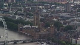 5.5K aerial stock footage of Big Ben and Parliament beside the river, London, England Aerial Stock Footage | AX115_115