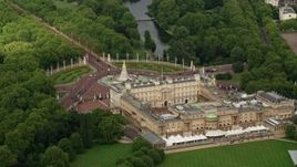 5.5K aerial stock footage orbiting Buckingham Palace and Victoria Memorial, London, England Aerial Stock Footage | AX115_130
