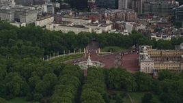 5.5K aerial stock footage of circling the Victoria Memorial at Buckingham Palace, London, England Aerial Stock Footage | AX115_133