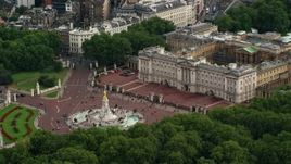 5.5K aerial stock footage of Victoria Memorial and front gates of Buckingham Palace, London, England Aerial Stock Footage | AX115_135