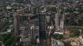 5.5K aerial stock footage of an approach to the Strata skyscraper, London, England Aerial Stock Footage | AX115_149E