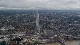 5.5K aerial stock footage of a wide orbit of The Shard and cityscape, London, England Aerial Stock Footage | AX115_177E