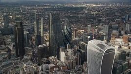 5.5K aerial stock footage approach The Gherkin and Leadenhall Building skyscrapers, Central London, England Aerial Stock Footage | AX115_187E