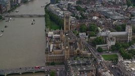 5.5K aerial stock footage of Big Ben, Parliament and Westminster Abbey by the Thames, London, England Aerial Stock Footage | AX115_198