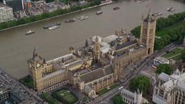 5.5K aerial stock footage approach Big Ben, Parliament and government offices on the Thames, London, England Aerial Stock Footage | AX115_212E