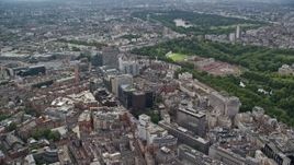 5.5K aerial stock footage pan across office buildings near Buckingham Palace, London, England Aerial Stock Footage | AX115_216E