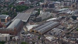 5.5K aerial stock footage of Kings Cross Station and office buildings, London, England Aerial Stock Footage | AX115_236E