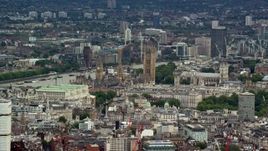 5.5K aerial stock footage of a view of Big Ben and Parliament among city buildings, London, England Aerial Stock Footage | AX115_240