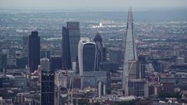5.5K aerial stock footage of a view of Central London skyscrapers, The Shard and Strata, England Aerial Stock Footage | AX115_277E