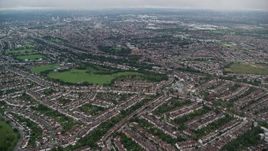 5.5K aerial stock footage fly over residential neighborhoods near Norbury Park, London, England Aerial Stock Footage | AX115_282E