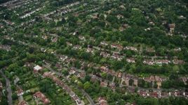5.5K aerial stock footage fly over suburban neighborhoods, Purley, England Aerial Stock Footage | AX115_295E