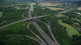 5.5K aerial stock footage of M23 and M25 freeway interchange in Redhill, England Aerial Stock Footage | AX115_309E