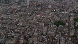 5.5K aerial stock footage of flying by Piccadilly Circus, London, England, twilight Aerial Stock Footage | AX116_031