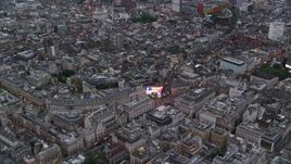 5.5K aerial stock footage of flying by Piccadilly Circus, London, England, twilight Aerial Stock Footage | AX116_031E
