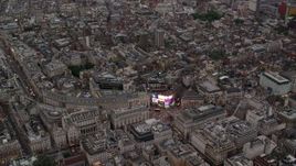 5.5K aerial stock footage of orbiting Piccadilly Circus in London, England, twilight Aerial Stock Footage | AX116_034