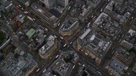 5.5K aerial stock footage of a bird's eye view of Oxford Circus, London, England, twilight Aerial Stock Footage | AX116_042E