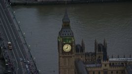 5.5K aerial stock footage orbiting Big Ben orbiting River Thames, London England, twilight Aerial Stock Footage | AX116_063
