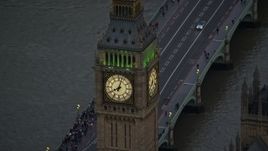 5.5K aerial stock footage of an orbit of Big Ben by the River Thames, London, England, twilight Aerial Stock Footage | AX116_064