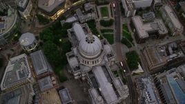 5.5K aerial stock footage tilt to bird's eye view of St Paul's Cathedral, London, England, twilight Aerial Stock Footage | AX116_084