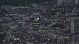 5.5K aerial stock footage of an orbit of the top of BT Tower, London, England, twilight Aerial Stock Footage | AX116_098