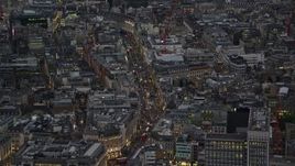 5.5K aerial stock footage of zooming in on Regent Street, London, England, night Aerial Stock Footage | AX116_101E
