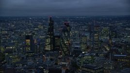 5.5K aerial stock footage flyby Leadenhall Building, The Gherkin, Heron Tower in London, England, night Aerial Stock Footage | AX116_161E