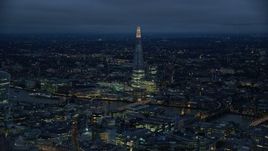 5.5K aerial stock footage of a view of The Shard and River Thames, London, England, night Aerial Stock Footage | AX116_173