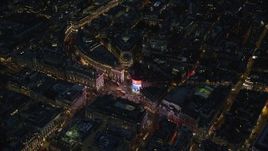 5.5K aerial stock footage of circling above Piccadilly Circus and city buildings, London, England, night Aerial Stock Footage | AX116_186