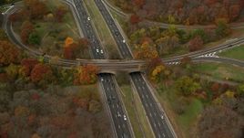 5.5K aerial stock footage of a freeway with light traffic in Autumn, Massapequa, New York Aerial Stock Footage | AX117_007