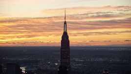 5.5K aerial stock footage of the famous Empire State Building at sunrise in Midtown Manhattan, New York City Aerial Stock Footage | AX118_007E