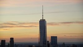 5.5K aerial stock footage of tilt up One World Trade Center at sunrise in Lower Manhattan, New York City Aerial Stock Footage | AX118_027