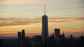 5.5K aerial stock footage of an orbit of One World Trade Center at sunrise in Lower Manhattan, New York City Aerial Stock Footage | AX118_029