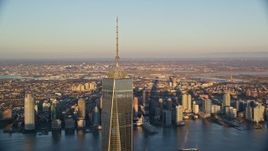5.5K aerial stock footage orbit the top of Freedom Tower at sunrise in Lower Manhattan, New York City Aerial Stock Footage | AX118_091